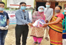 গুইমারায় খাগড়াপুর মহিলা কল্যাণ সমিতির ত্রাণ বিতরণ
